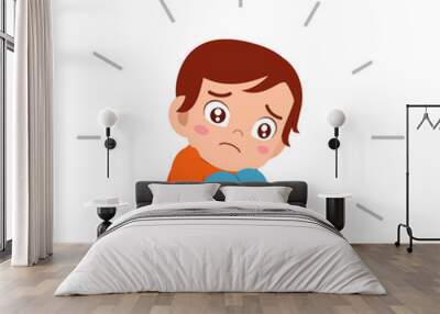 cute sad kid boy sitting alone scared Wall mural