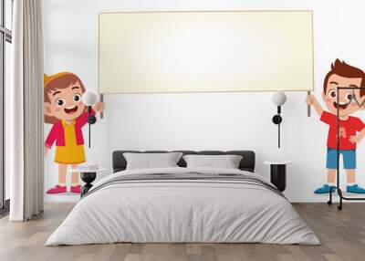 happy cute kid boy and girl holding blank banner Wall mural