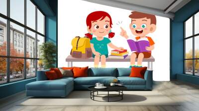 happy cute kids boy and girl read book together Wall mural