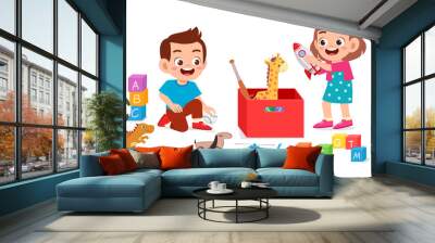 happy cute little kid boy and girl playing with toys Wall mural