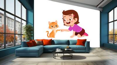 little girl playing together with cute cat Wall mural