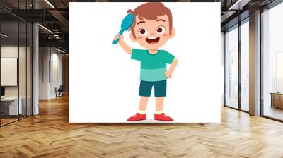 little kid comb hair with hair brush Wall mural