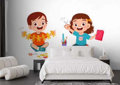 little kid cut paper for art with friend Wall mural