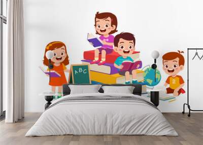 little kid read book together with friend Wall mural