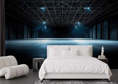 A large hangar with a metal structure on the ceiling is shown, representing spacious industrial design.. Wall mural