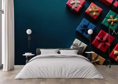 Colorful gift boxes with bows on a blue background. Gift boxes and boxing Day Concept. Wall mural