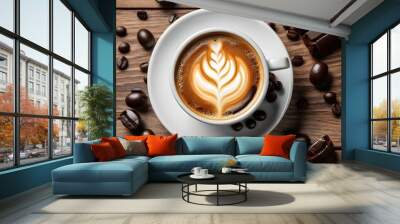 A cup of coffee, espresso machiatto or cappuccino, surrounded by coffee beans and chocolate Wall mural