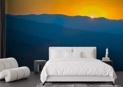 Glorious Sunrise over the Great Smoky Mountains layered blue ridges to the orange yellow horizon Wall mural