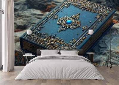 ornate blue book with pieces of indigo and precious stones inlaid, gold gilding Wall mural