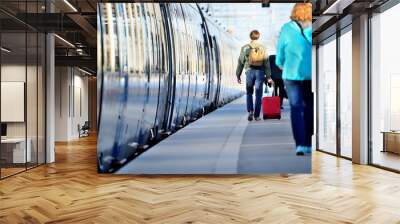 People hurrying to catch train Wall mural