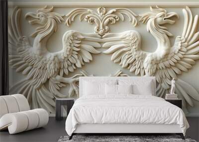 Carving of two birds with spread wings Wall mural