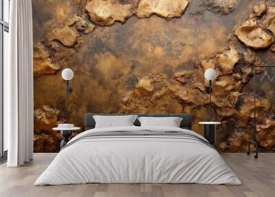 Close-up texture of a golden metallic surface with a rough, textured appearance. Wall mural