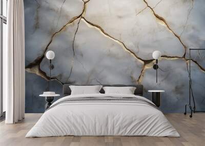 Closeup of a cracked, white surface with gold accents. Wall mural