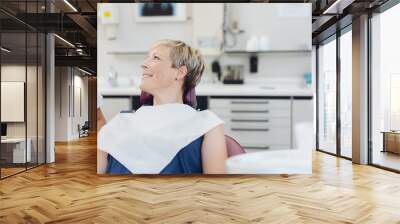 Attractive woman patient in a dental surgery Wall mural