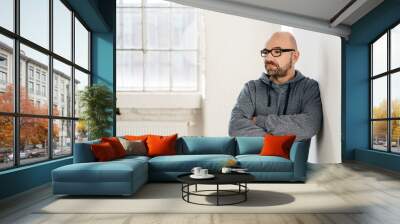 Portrait of a solitary middle-aged man thinking Wall mural