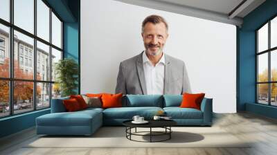 Smart middle-aged bearded man in grey jacket Wall mural