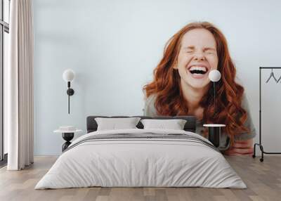 Young woman with a good sense of humor Wall mural