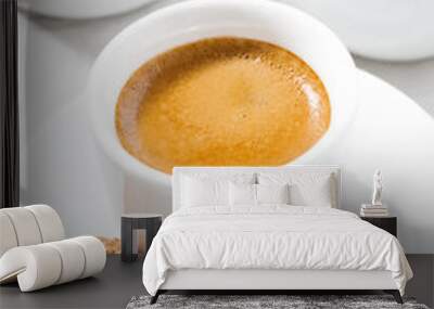 cup of espresso and almond cookies on a white table, closeup  Wall mural