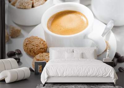 cup of espresso and cookies on a white table, closeup Wall mural