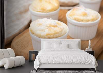 peach souffle in the portioned form on a wooden board Wall mural