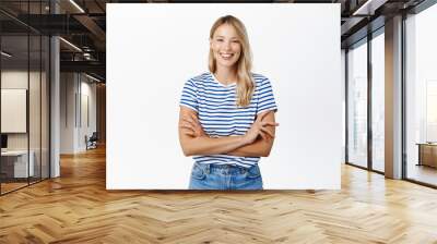 Beautiful happy girl laughing and smiling. Modern scandinavian woman posing against white background, looking happy, wearing summer clothes Wall mural