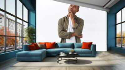 Hmmm interesting. Portrait of thoughtful handsome, smart african american man thinking, making choice, squinting and looking up, pondering decision, standing white background Wall mural