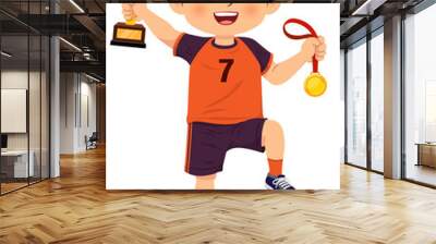 Happy smiling boy stands holding gold medal and trophy from winning football games Wall mural