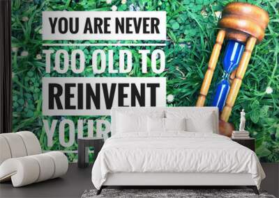 Motivational and inspirational quote - You are never too old to reinvent yourself. With vintage styled background. Wall mural