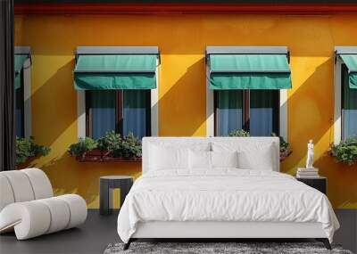 stylish yellow and orange building facade with green window shades Wall mural