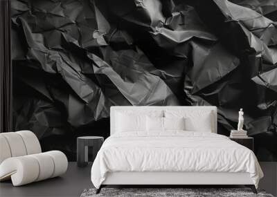 Crumpled black paper texture. Wall mural