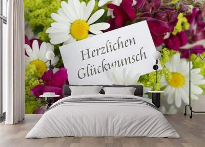 Congratulations / Greeting card with snapdragons, daisies and German text: Congratulations  Wall mural