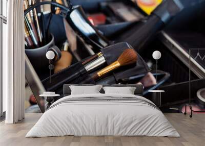 Dedicated focus Make-up converter on makeup artist's table with lots of makeup artist tools. The stack surrounds the makeup artist's table, leaving room for text. Wall mural