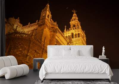 the lights of the night illuminate the splendid architecture of Seville Wall mural