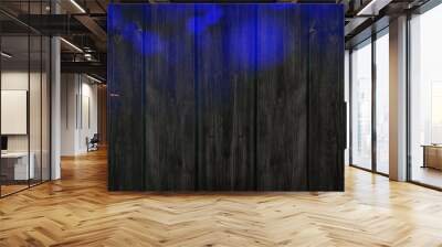 Silvester Party Celebration background banner panorama long- Blue golden firework and bokeh lights on dark black wooden wall texture, with space for text Wall mural