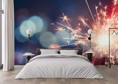 Sylvester New Year, New Year's Eve 2024 party event celebration holiday greeting card - Closeup of sparkling sparklers and bokeh lights in the background Wall mural