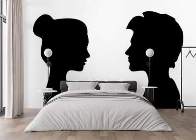 Male and female silhouettes opposite each other, isolated vector Wall mural