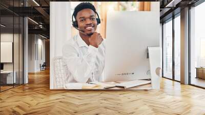 Call center, communication and black man talking with people on the internet and working in sales for telemarketing company. Portrait of an African customer service worker consulting on a pc online Wall mural