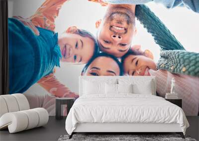 Smile, huddle and portrait of family with support, blue sky and bonding together in nature. Low angle, face and parents with man and woman for childhood, solidarity and fun or joy with embrace Wall mural