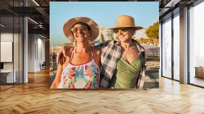 Summer, senior friends and women at beach day on weekend, retirement holiday and vacation. Travel, friendship and smile, happy and excited elderly females on adventure, freedom and relax in Miami Wall mural