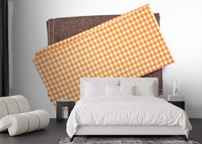 a orange brown checkered napkin table clothes  on white background. Wall mural