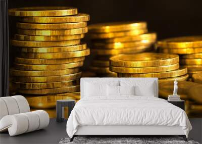 Close up gold money coin stacking on dark background Wall mural