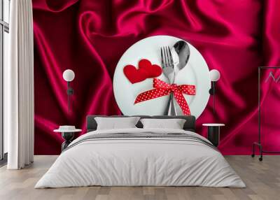 red heart shape with White empty plate with fork and spoon on re Wall mural