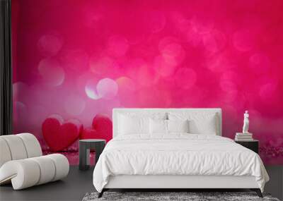 red Heart shapes on abstract light glitter background in love co Wall mural