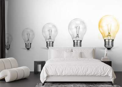 the Light bulb with one growth of glowing bulb on white background ,  growth success of business creative idea concept Wall mural