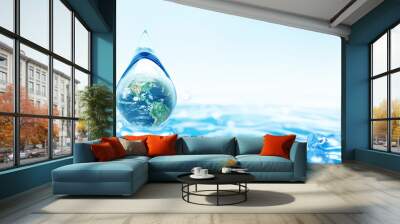 World Water day concept with world in clean water drop on nature green and water ripples design, Environment save and ecology theme concept, Elements of this image furnished by NASA Wall mural