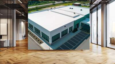 Modern industrial warehouse, aerial view, large parking lot Wall mural