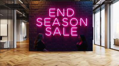 Two women walking past end of season sale neon sign Wall mural