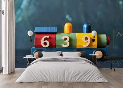 Development program for children. Toy colored wooden train, the elements of which contain different numbers. Wall mural