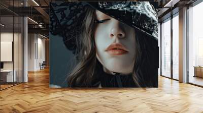 Elegant Woman in Artistic Black Hat and Flowing Hair Wall mural