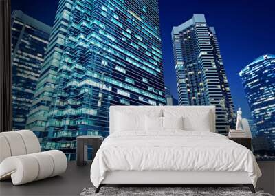 Tall office buildings by night Wall mural